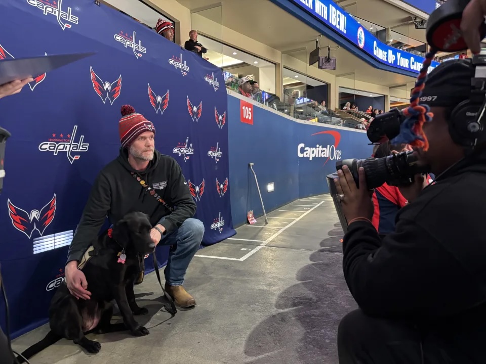 Harley and Claire pose as they are introduced to the crowd.